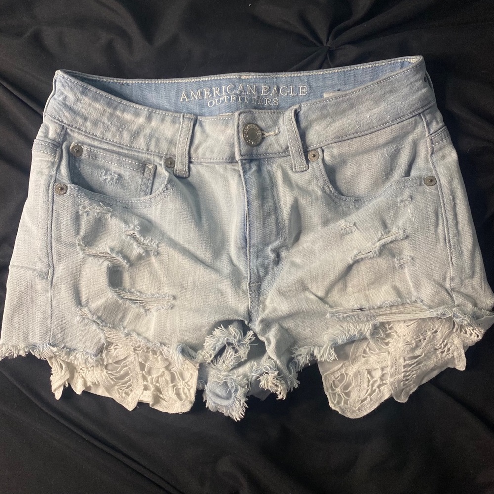 ripped shorts w/ showing pockets